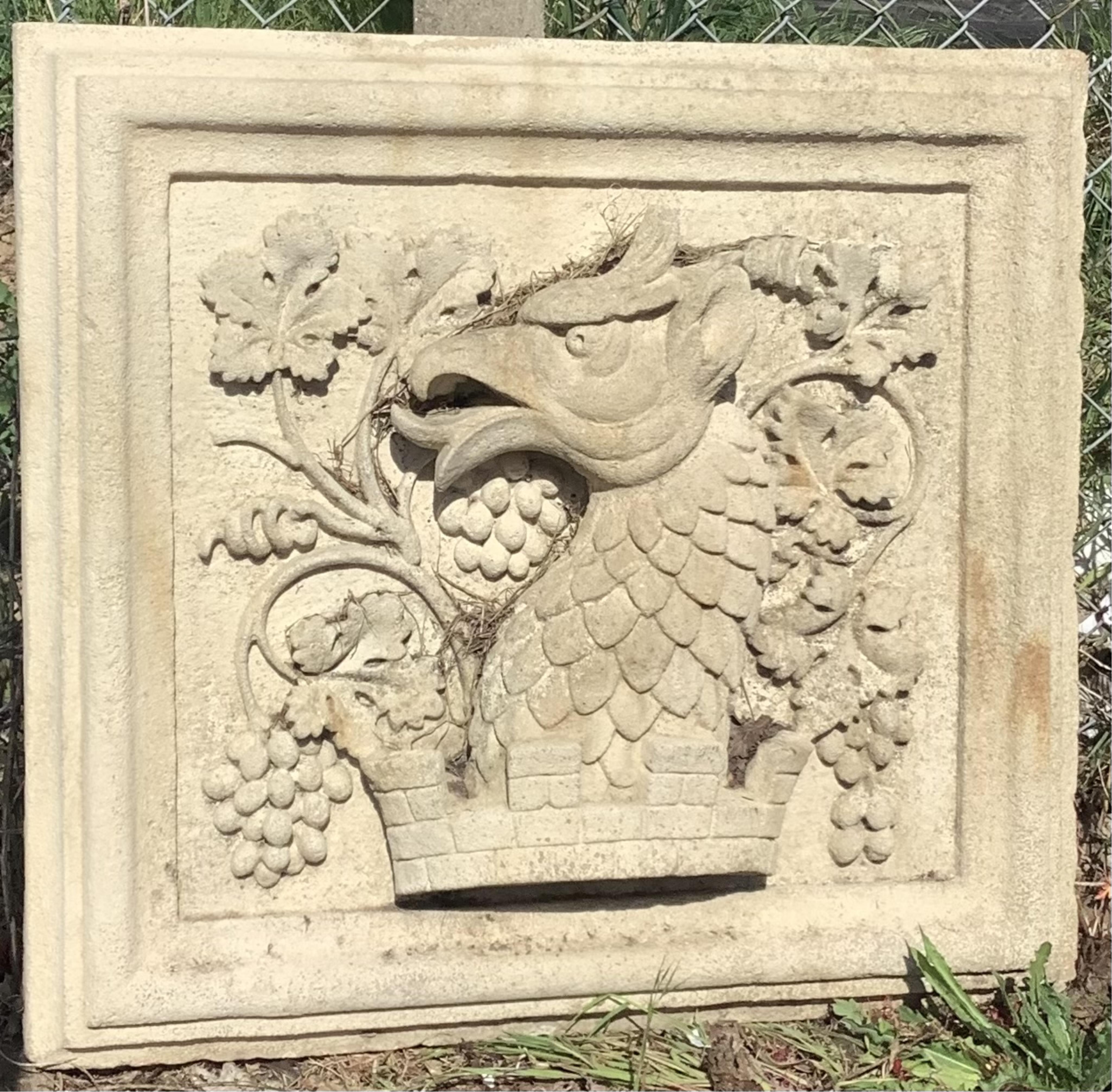 A rectangular cast stone Heraldic garden plaque, width 82cm, height 79cm